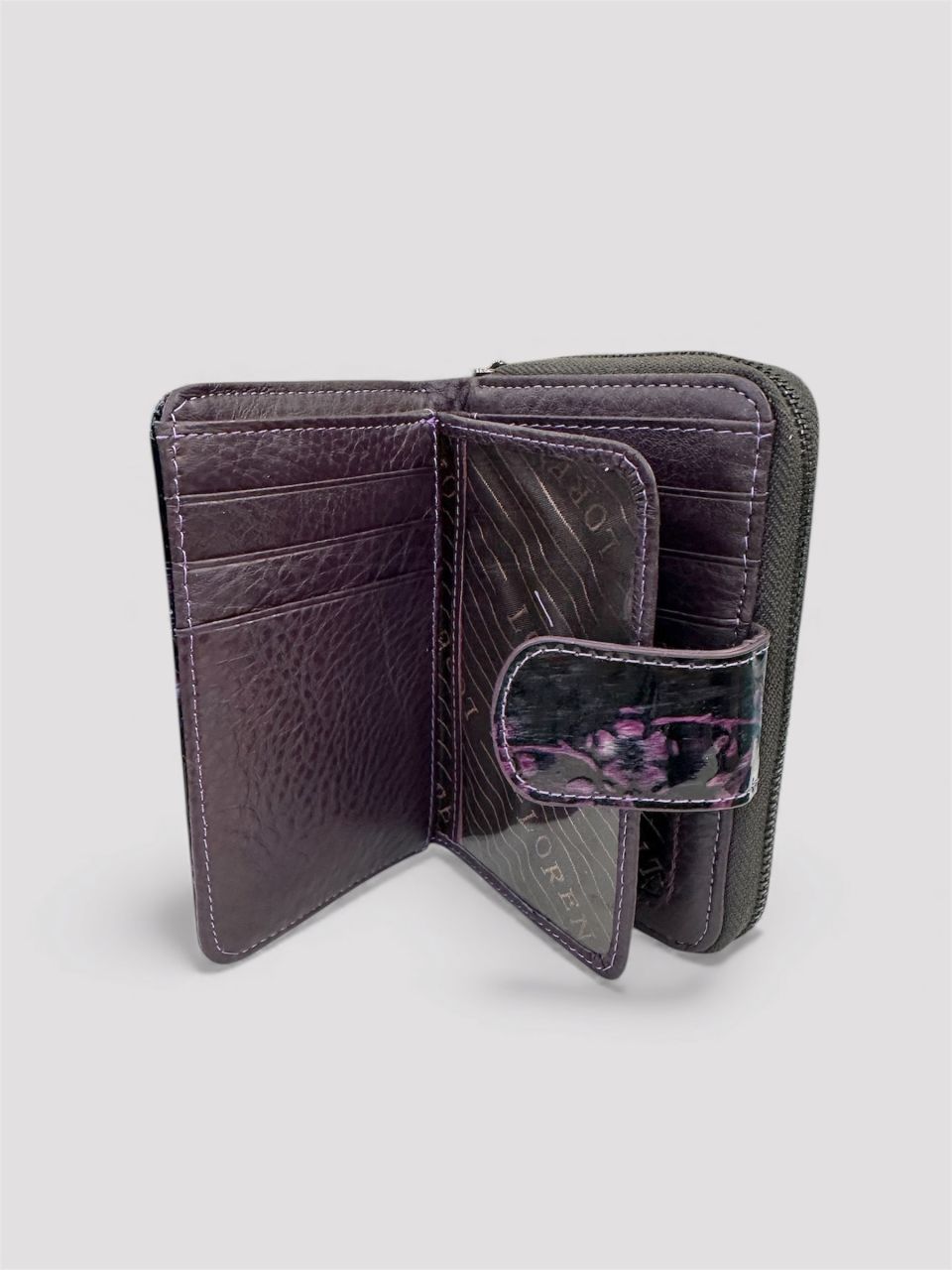 Fekete - lila női lakkbőr patentos pénztárca Fekete - lila női lakkbőr patentos pénztárca